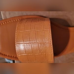 Women's brown leather slides